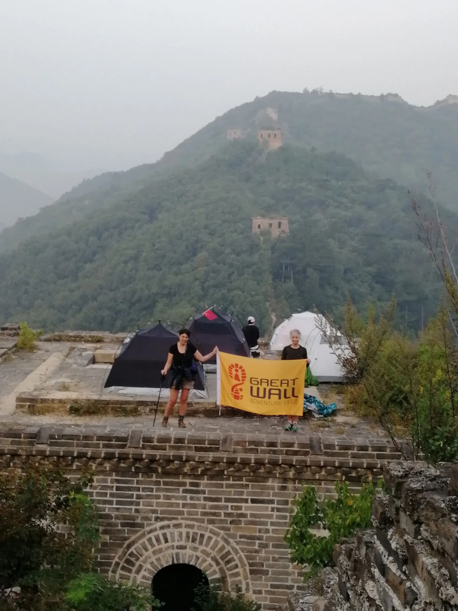 Walk with the People Who Know the Wall — mountain landscape and Great Wall towers